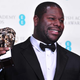British director Steve McQueen with the award for best film for 12 Years a Slave at the BAFTA British Academy Film Awards at the Royal Opera House in London, Feb. 16, 2014
CARL COURT/AFP/Getty Images